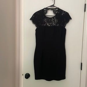 Never worn with tags black lace cap sleeve lulu’s dress w/ key hole back-size XL